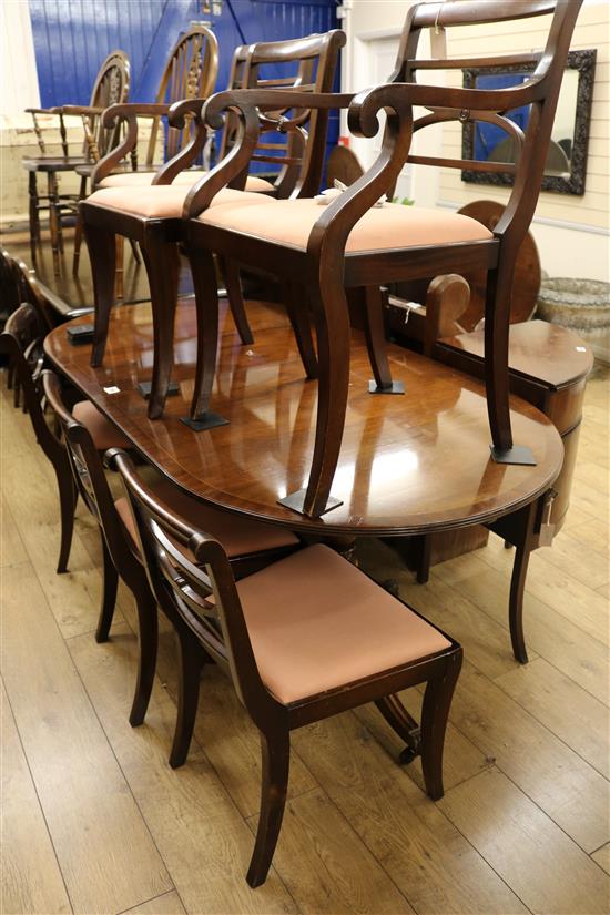 A mahogany twin pillar dining table and six chairs, W.183cm (without leaf)